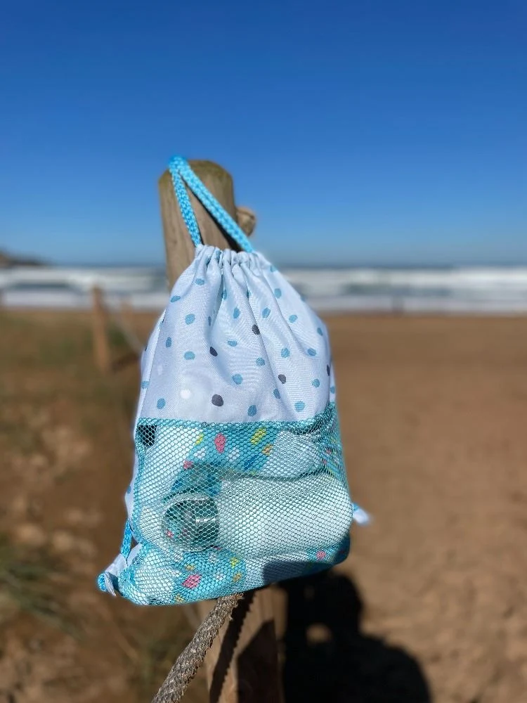 Mochila saco antiarena lunares (varios modelos) (Liquidación)